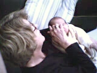 Grandma Bonnie holding little Linnea.